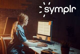 Doctors pointing at a screen